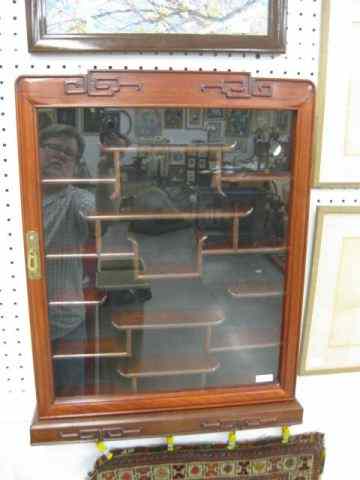 Appraisal: Oriental Rosewood Wall Cabinet great for netsukes or snuff bottles