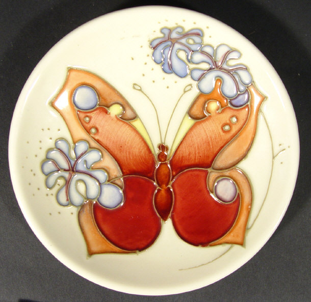 Appraisal: Moorcroft pottery dish hand painted and tubelined with a butterfly