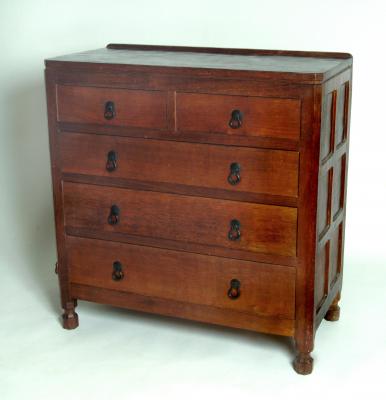 Appraisal: AN ADZED OAK CHEST by Robert Thompson Kilburn with stepped