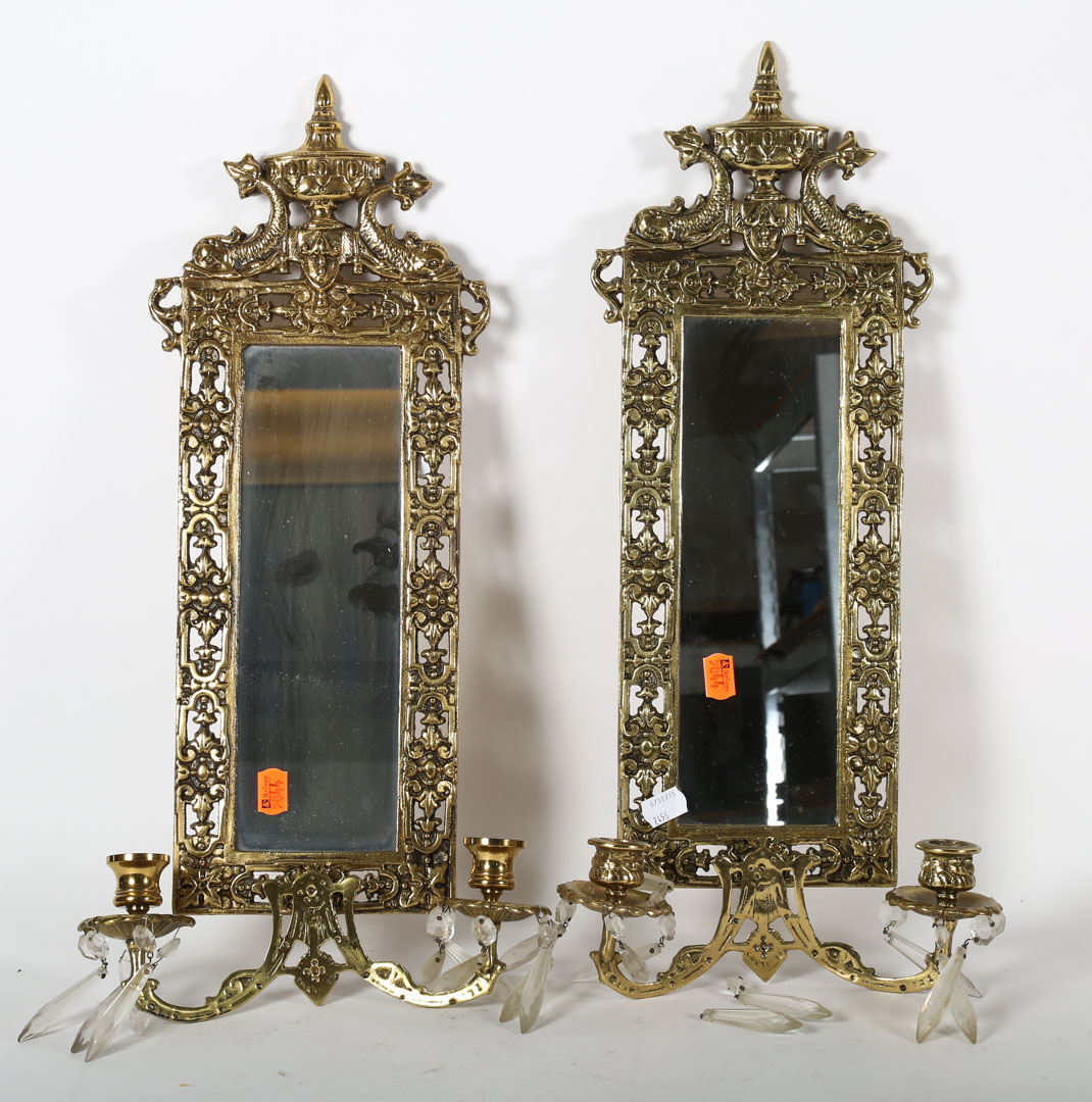 Appraisal: Pair of brass framed wall mirrors Undernumber