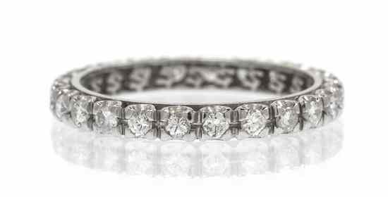 Appraisal: A Platinum and Diamond Eternity Band containing round brilliant cut