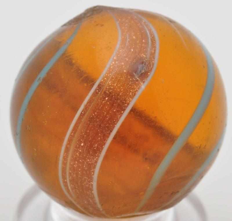 Appraisal: Amber Transparent Banded Lutz Marble Description Amber transparent base with