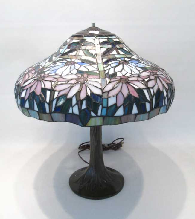 Appraisal: STAINED AND LEADED GLASS TABLE LAMP the domed shade with