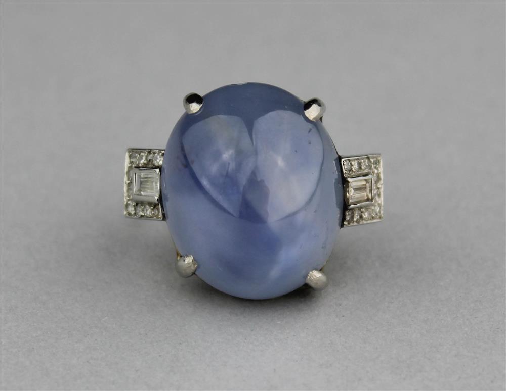 Appraisal: PLATINUM AND STAR SAPPHIRE RING WITH DIAMONDS star sapphire in