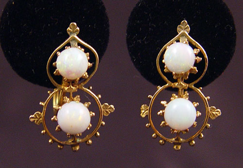 Appraisal: K OPAL EARRINGS K yellow gold earrings contain four round