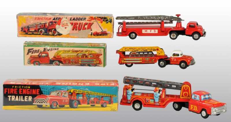 Appraisal: Lot of Tin Fire Ladder Truck Friction Toys Description Japanese