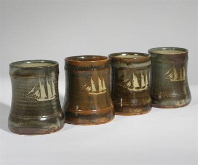 Appraisal: An unusual set of four Leach Pottery stoneware tankards each