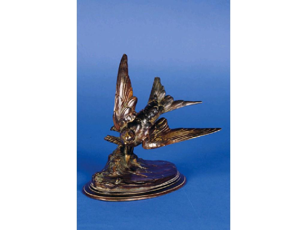 Appraisal: PAUL COMOLERA A CAST BRONZE SCULPTURE OF A SWALLOW in