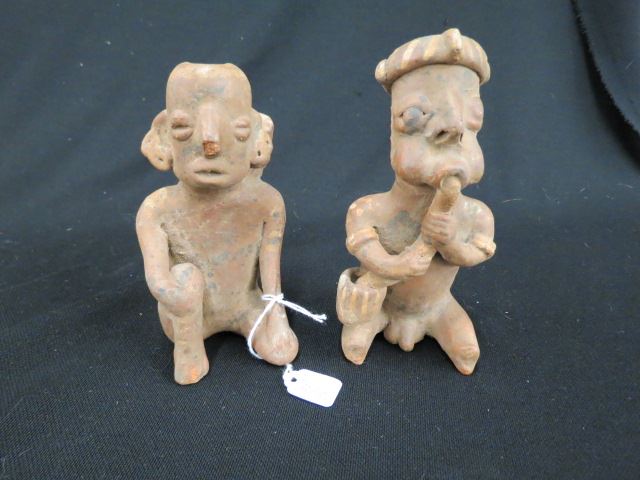 Appraisal: Pre-Columbian Pottery Figures male female