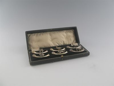 Appraisal: A modern cased set of six wishbone napkin rings each