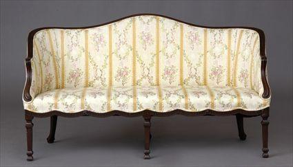 Appraisal: GEORGE III-STYLE MAHOGANY SETTEE The serpentine fronted top rail continuing