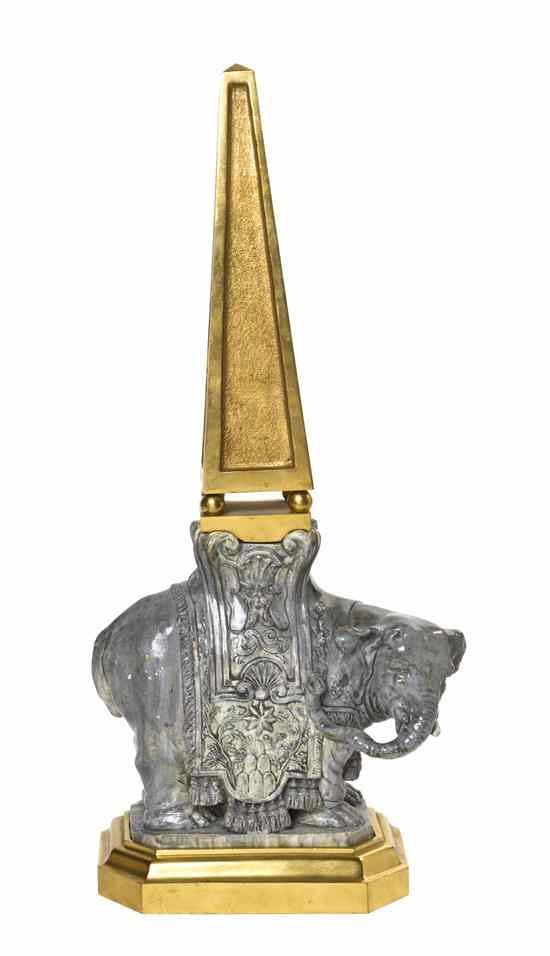 Appraisal: A Gilt Bronze and Ceramic Figural Obelisk the tapering obelisk