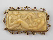 Appraisal: An antique yellow metal tests carat gold mounted brooch engraved