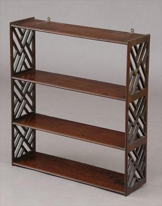 Appraisal: GEORGE III MAHOGANY HANGING SHELF With three shelves and fretwork