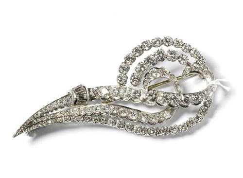 Appraisal: DIAMOND BROOCH ca Platinum Decorative elegant brooch in the shape