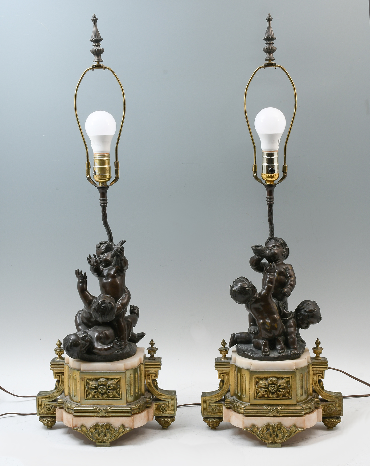 Appraisal: PAIR OF TH CENTURY FRENCH BRONZE PUTTI FIGURURAL LAMPS Overall