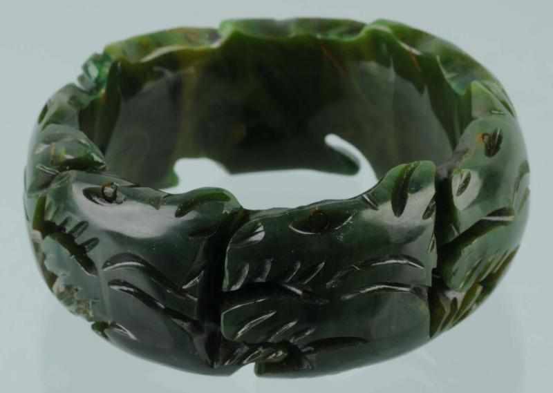 Appraisal: Vintage Bakelite Scottie Dog Bracelet Description Green and yellow deeply