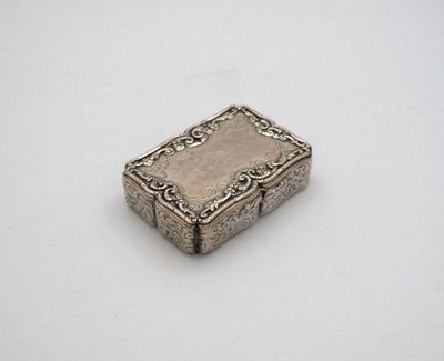 Appraisal: A Victorian silver snuff box by Nathaniel Mills Birmingham shaped