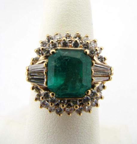 Appraisal: Lady's Radiant Emerald Round Brilliant Cut and Baguette Diamond Ring