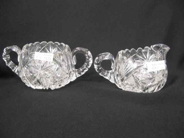 Appraisal: Cut Glass Creamer Sugar feathered star starburst motif '' tall