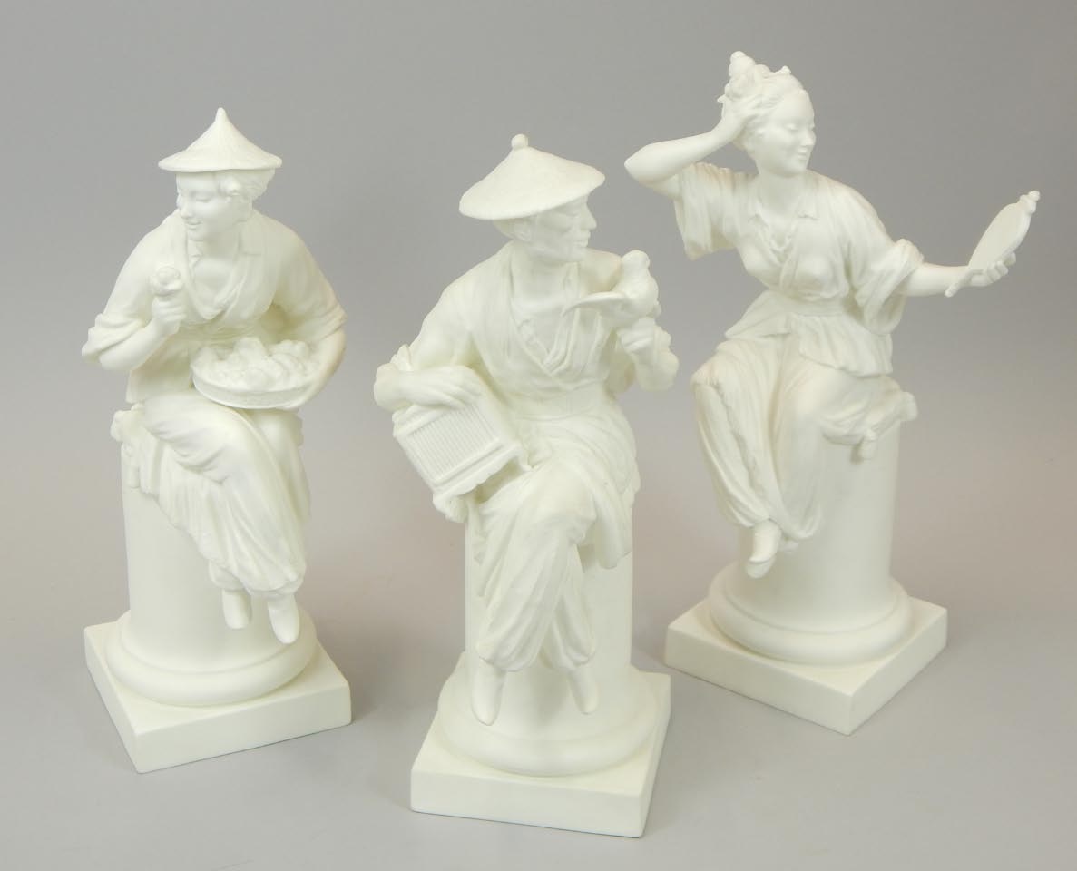 Appraisal: A set of three Royal Worcester porcelain figures each modelled