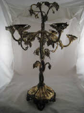 Appraisal: A large Victorian silver plated naturalistic vine centrepiece six light