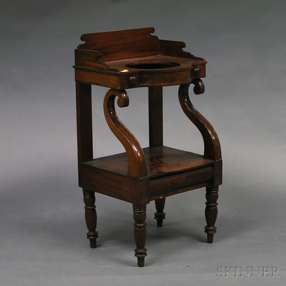 Appraisal: Classical Mahogany Veneer Washstand early th century with shaped back