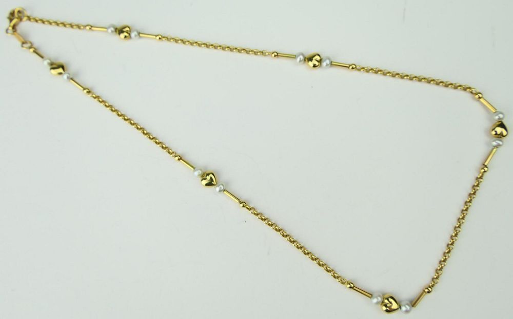 Appraisal: KT YELLOW GOLD AND PEARL NECKLACE CHOKER Measures about long