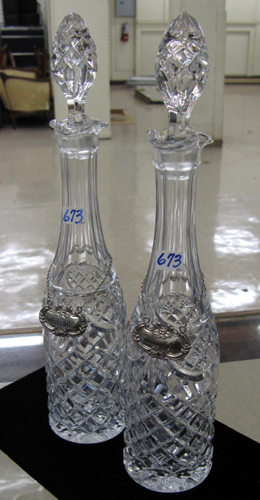 Appraisal: PAIR OF CUT CRYSTAL TALL DECANTERS having Sterling Silver tags