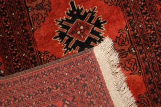 Appraisal: BOKHARA HAND WOVEN ORIENTAL RUG W ' L ' Rust