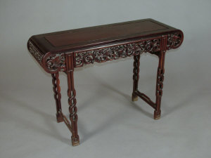 Appraisal: A Chinese carved rosewood alter table th century the inset