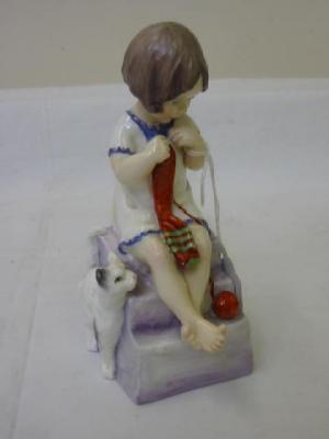 Appraisal: A ROYAL WORCESTER PORCELAIN FIGURE Saturday's Child modelled as a