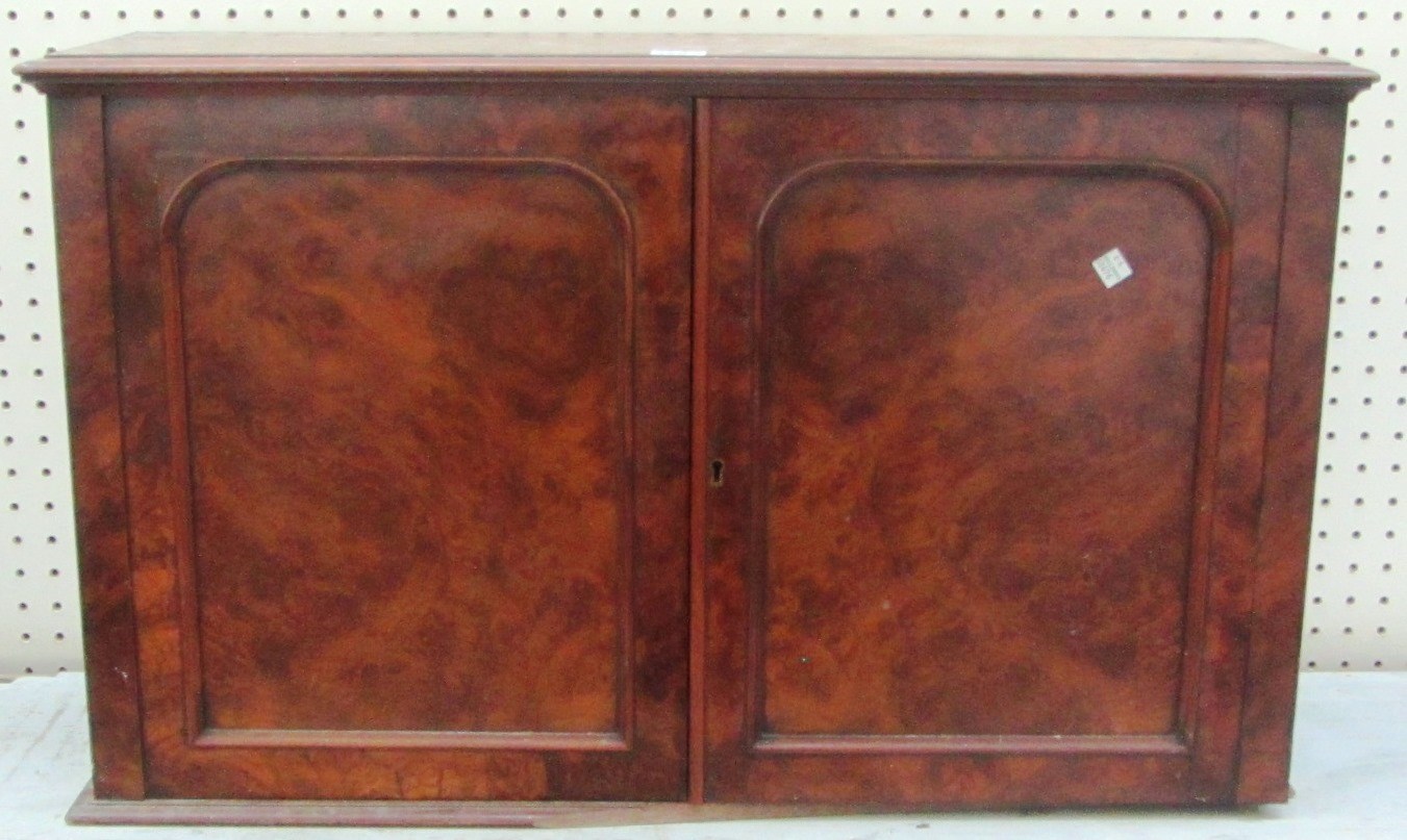 Appraisal: A th century figured walnut small two door cupboard cm