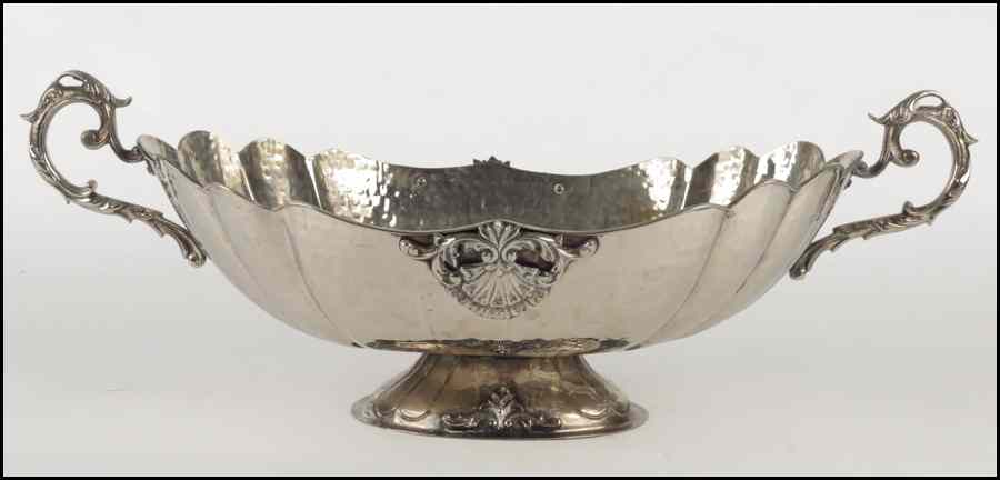 Appraisal: CONTEMPORARY HAMMERED SILVERPLATE TWO-HANDLED PEDESTAL BOWL H '' W ''