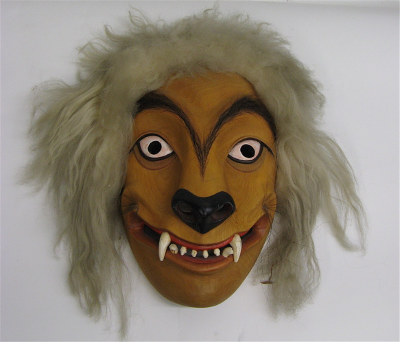 Appraisal: LOU CACIOPPO WILD HAIR CARVED ALDERWOOD MASK Alaska th century-