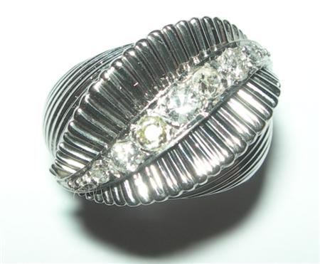 Appraisal: A 's diamond set ring the diagonally fluted domed front