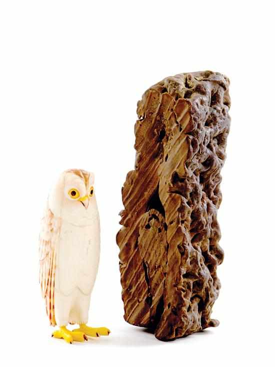 Appraisal: Japanese carved and painted ivory owl and abstract sculpture standing