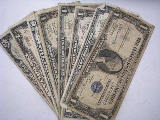 Appraisal: Eight Silver Certificates including -A Ten Dollar North African Note