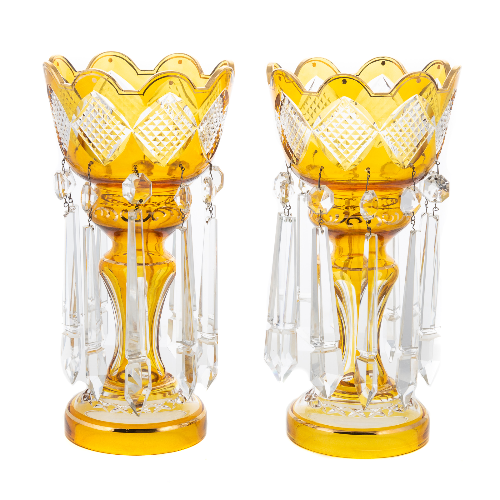 Appraisal: A PAIR OF BOHEMIAN STYLE GLASS LUSTRES Amber cut to