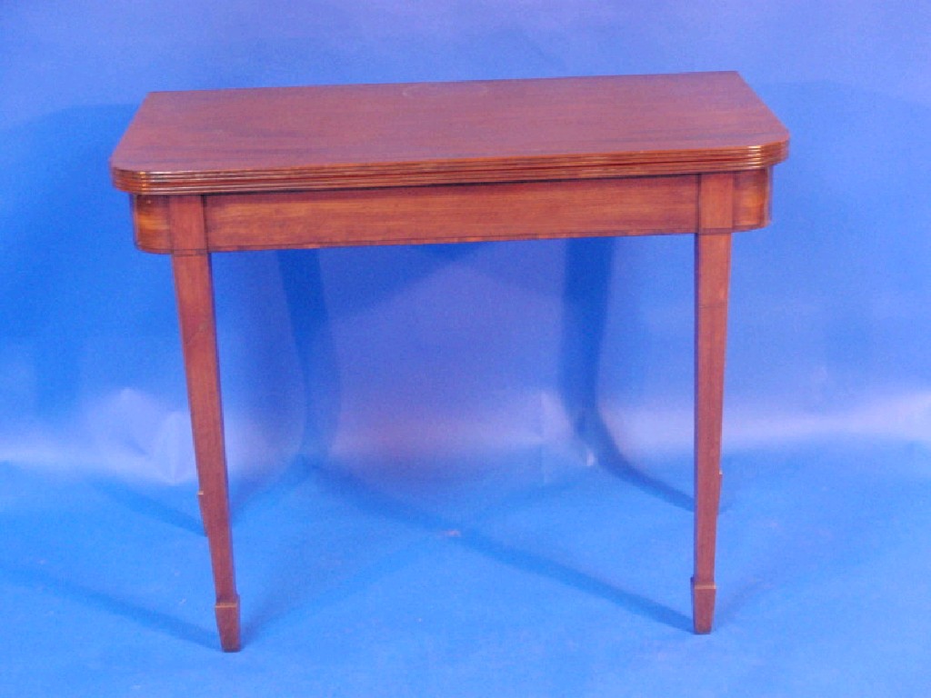 Appraisal: A Regency mahogany tea table with reeded folding top square