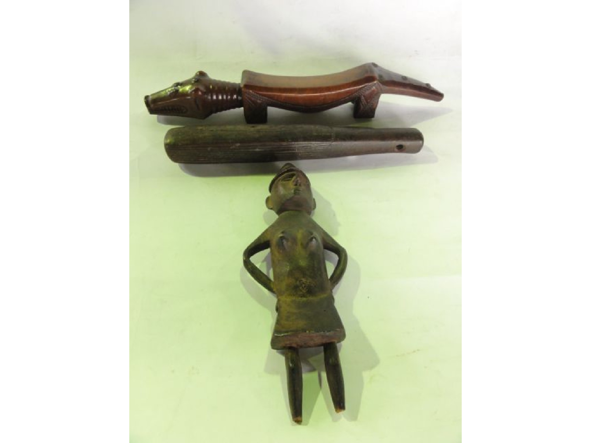 Appraisal: An African carved timber doll figure in the form of