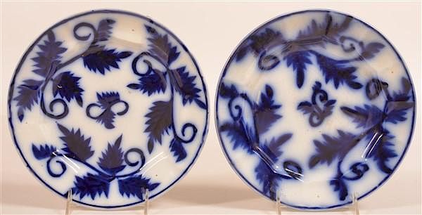 Appraisal: Two Flow Blue Brush Stroke Leaf Pattern Plates Two Flow