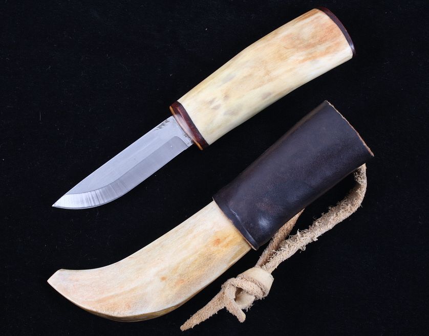 Appraisal: Buffalo Bone Handle Knife Bone Sheath Included in this lot