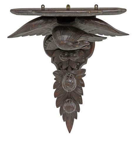 Appraisal: Black Forest carved wood mounted wall bracket having shaped top