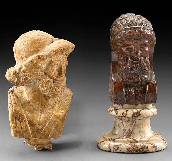 Appraisal: Two carved hardstone busts The first depicting a bearded Olympian