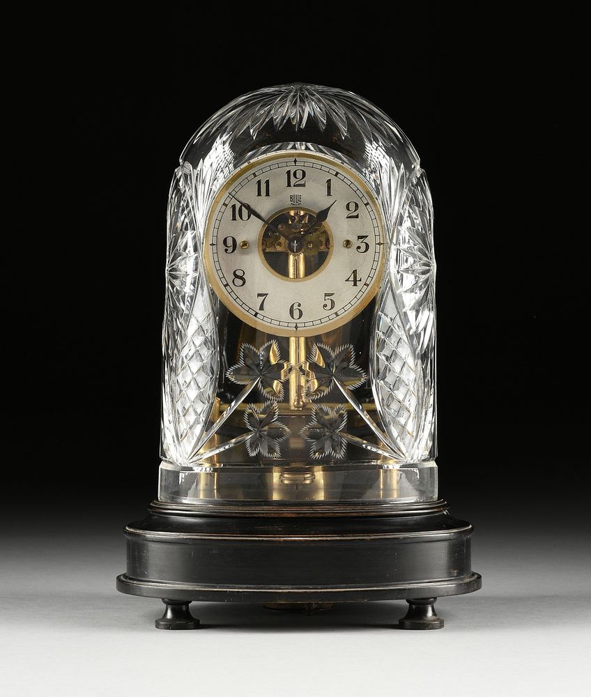 Appraisal: AN ELECTROMAGNETIC BRASS SKELETON CLOCK BY BULLE FRENCH NUMBERED EARLY