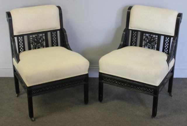 Appraisal: Pair of Victorian Aesthetic Ebonized Armchairs Muslin upholstery From a