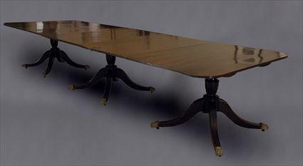 Appraisal: George III-Style Mahogany Three-Pedestal Dining Table together with two leaves