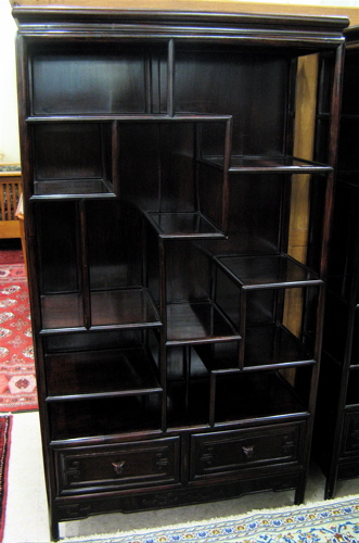 Appraisal: CHINESE ROSEWOOD ETAGERE the open front exhibiting nine open shelves