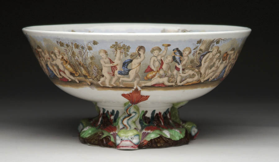 Appraisal: LARGE FANCY FOOTED PUNCHBOWL White ironstone type punchbowl has inside